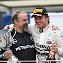 James Waddell (GBR) Mercedes AMG F1 Race Team Composite Technician and race winner Nico Rosberg (GER) Mercedes AMG F1  celebrate with the trophy on the podium at Formula One World Championship, Rd18, Brazilian Grand Prix, Race, Interlagos, Sao Paulo, Brazil, Sunday 15 November 2015. © Sutton Motorsport Images
