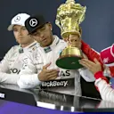 Nico Rosberg (GER) Mercedes AMG F1, Lewis Hamilton (GBR) Mercedes AMG F1 and Sebastian Vettel (GER) Ferrari in the press conference with the trophy   at Formula One World Championship, Rd9, British Grand Prix, Race, Silverstone, England, Sunday 5 July 2015. © Sutton Motorsport Images