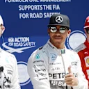(L to R): Nico Rosberg (GER) Mercedes AMG F1, Lewis Hamilton (GBR) Mercedes AMG F1 and Kimi Raikkonen (FIN) Ferrari celebrate in parc ferme at Formula One World Championship, Rd7, Canadian Grand Prix, Qualifying, Montreal, Canada, Saturday 6 June 2015. © Sutton Motorsport Images