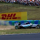 Lewis Hamilton (GBR) Mercedes AMG F1 W06 goes through the gravel on lap 1 at Formula One World Championship, Rd10, Hungarian Grand Prix, Race, Hungaroring, Hungary, Sunday 26 July 2015. © Sutton Motorsport Images