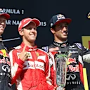 (L to R): Daniil Kyvat (RUS) Red Bull Racing, Race winner Sebastian Vettel (GER) Ferrari and Daniel Ricciardo (AUS) Red Bull Racing celebrate with the trophy on the podium  at Formula One World Championship, Rd10, Hungarian Grand Prix, Race, Hungaroring, Hungary, Sunday 26 July 2015. © Sutton Motorsport Images