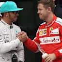 Congratulation for taking pole position to Lewis Hamilton (GBR) Mercedes AMG F1 from Sebastian Vettel (GER) Ferrari at Formula One World Championship, Rd2, Malaysian Grand Prix, Qualifying, Sepang, Malaysia, Saturday 28  March 2015. © Sutton Motorsport Images