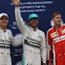 (L to R): Third placed Nico Rosberg (GER) Mercedes AMG F1, pole sitter Lewis Hamilton (GBR) Mercedes AMG F1 and second placed Sebastian Vettel (GER) Ferrari celebrates in parc ferme at Formula One World Championship, Rd2, Malaysian Grand Prix, Qualifying, Sepang, Malaysia, Saturday 28  March 2015. © Sutton Motorsport Images