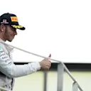 Lewis Hamilton (GBR) Mercedes AMG F1 celebrates on the Podium at Formula One World Championship, Rd2, Malaysian Grand Prix, Race, Sepang, Malaysia, Sunday 29 March 2015. © Sutton Motorsport Images