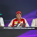 (L to R): Lewis Hamilton (GBR) Mercedes AMG F1, Sebastian Vettel (GER) Ferrari and Nico Rosberg (GER) Mercedes AMG F1 in the post race Press at Formula One World Championship, Rd2, Malaysian Grand Prix, Race, Sepang, Malaysia, Sunday 29 March 2015. © Sutton Motorsport Images