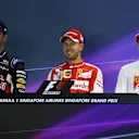 (L to R): Daniel Ricciardo (AUS) Red Bull Racing, pole sitter Sebastian Vettel (GER) Ferrari and Kimi Raikkonen (FIN) Ferrari in the press conference at Formula One World Championship, Rd13, Singapore Grand Prix, Qualifying, Marina Bay Street Circuit, Singapore, Saturday 19  September 2015. © Sutton Motorsport Images