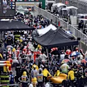 Cars and mechanics in the pitlane at Formula One World Championship, Rd20, Brazilian Grand Prix, Race, Interlagos, Sao Paulo, Brazil, Sunday 13 November 2016. © Sutton Images