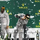 Nico Rosberg (GER) Mercedes AMG F1, Bradley Lord (GBR) Mercedes AMG F1 Communication Manager, Lewis Hamilton (GBR) Mercedes AMG F1 and Max Verstappen (NED) Red Bull Racing celebrate on the podium at Formula One World Championship, Rd20, Brazilian Grand Prix, Race, Interlagos, Sao Paulo, Brazil, Sunday 13 November 2016. © Sutton Images