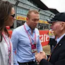 Chris Hoy (GBR) and wife Sarra Kemp (GBR) on the grid with John Surtees (GBR) at Formula One World Championship, Rd10, British Grand Prix, Race, Silverstone, England, Sunday 10 July 2016. © Sutton Images