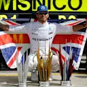 Race winner Lewis Hamilton (GBR) Mercedes AMG F1 celebrates with the team at Formula One World Championship, Rd10, British Grand Prix, Race, Silverstone, England, Sunday 10 July 2016. © Sutton Images