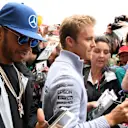 Lewis Hamilton (GBR) Mercedes AMG F1 and Nico Rosberg (GER) Mercedes AMG F1 at the fans autograph session at Formula One World Championship, Rd10, British Grand Prix, Preparations, Silverstone, England, Thursday 7 July 2016. © Sutton Images