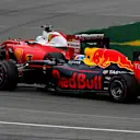 Sebastian Vettel (GER) Ferrari SF16-H and Daniel Ricciardo (AUS) Red Bull Racing RB12 battle at Formula One World Championship, Rd7, Canadian Grand Prix, Race, Montreal, Canada, Sunday 12 June 2016. © Sutton Images