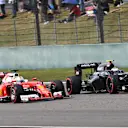 Sebastian Vettel (GER) Ferrari SF16-H and Fernando Alonso (ESP) McLaren MP4-31 battle at Formula One World Championship, Rd3, Chinese Grand Prix, Race, Shanghai, China, Sunday 17 April 2016. © Sutton Motorsport Images