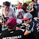 Lewis Hamilton (GBR) Mercedes AMG F1 and Carlos Sainz (ESP) Scuderia Toro Rosso meet the fans at the autograph session at Formula One World Championship, Rd8, European Grand Prix, Preparations, Baku City Circuit, Baku, Azerbaijan, Thursday 16 June 2016. © Sutton Images