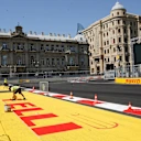 Track signage is painted at Formula One World Championship, Rd8, European Grand Prix, Preparations, Baku City Circuit, Baku, Azerbaijan, Thursday 16 June 2016. © Sutton Images