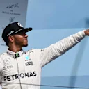 Race winner Lewis Hamilton (GBR) Mercedes AMG F1 celebrates on the podium at Formula One World Championship, Rd11, Hungarian Grand Prix, Race, Hungaroring, Hungary, Sunday 24 July 2016. © Sutton Images