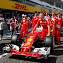 Ferrari mechanics with Ferrari SF16-H in pit lane at Formula One World Championship, Rd17, Japanese Grand Prix, Preparations, Suzuka, Japan, Thursday 6 October 2016. © Sutton Images