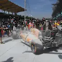 The burning car of Kevin Magnussen (DEN) Renault Sport F1 Team RS16 in pit lane during FP1 at Formula One World Championship, Rd16, Malaysian Grand Prix, Practice, Sepang, Malaysia, Friday 30 September 2016. © Sutton Images