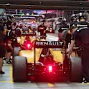 Jolyon Palmer (GBR) Renault Sport F1 Team RS16 and Kevin Magnussen (DEN) Renault Sport F1 Team RS16 pit stop at Formula One World Championship, Rd15, Singapore Grand Prix, Practice, Marina Bay Street Circuit, Singapore, Friday 16 September 2016. © Sutton Images