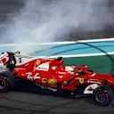 Sebastian Vettel (GER) Ferrari SF70-H celebrates and performs donuts in parc ferme at Formula One World Championship, Rd20, Abu Dhabi Grand Prix, Race, Yas Marina Circuit, Abu Dhabi, UAE, Sunday 26 November 2017. © Lionel Ng/Sutton Images