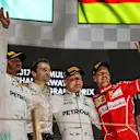 Lewis Hamilton (GBR) Mercedes AMG F1, Valtteri Bottas (FIN) Mercedes AMG F1 and Sebastian Vettel (GER) Ferrari celebrate on the podium at Formula One World Championship, Rd20, Abu Dhabi Grand Prix, Race, Yas Marina Circuit, Abu Dhabi, UAE, Sunday 26 November 2017. © Kym Illman/Sutton Images