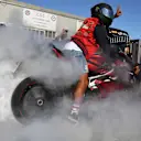 Lewis Hamilton (GBR) Mercedes AMG F1 does a burnout on his motorbike at Formula One World Championship, Rd13, Italian Grand Prix, Qualifying, Monza, Italy, Sunday 3 September 2017. © Sutton Images