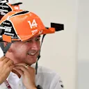 Jonathan Neale (GBR) McLaren Managing Director with fans hat at Formula One World Championship, Rd16, Japanese Grand Prix, Qualifying, Suzuka, Japan, Saturday 7 October 2017. © Mark Sutton/Sutton Images