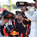Daniel Ricciardo (AUS) Red Bull Racing and Lewis Hamilton (GBR) Mercedes AMG F1 celebrate on the podium with the champagne at Formula One World Championship, Rd16, Japanese Grand Prix, Race, Suzuka, Japan, Sunday 8 October 2017. © Mark Sutton/Sutton Images