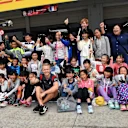 Kevin Magnussen (DEN) Haas F1 and young fans at Formula One World Championship, Rd16, Japanese Grand Prix, Preparations, Suzuka, Japan, Thursday 5 October 2017. © Mark Sutton/Sutton Images