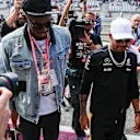 Usain Bolt (JAM) and Lewis Hamilton (GBR) Mercedes AMG F1 at Formula One World Championship, Rd17, United States Grand Prix, Race, Circuit of the Americas, Austin, Texas, USA, Sunday 22 October 2017. © Kym Illman/Sutton Images