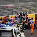 Medics and marshals assist Nico Hulkenberg, Renault Sport F1 Team R.S. 18 who crashed and rolled on lap one at Formula One World Championship, Rd21, Abu Dhabi Grand Prix, Race, Yas Marina Circuit, Abu Dhabi, UAE, Sunday 25 November 2018.
