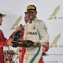 Sebastian Vettel (GER) Ferrari and Lewis Hamilton (GBR) Mercedes-AMG F1 celebrate on the podium at Formula One World Championship, Rd2, Bahrain Grand Prix, Race, Bahrain International Circuit, Sakhir, Bahrain, Sunday 8 April 2018.©Mark Sutton/Sutton Images