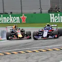 Daniel Ricciardo, Red Bull Racing RB14 and Brendon Hartley, Scuderia Toro Rosso STR13 battle at Formula One World Championship, Rd14, Italian Grand Prix, Race, Monza, Italy, Sunday 2 September 2018. © Jerry Andre/Sutton Images