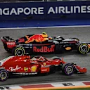 Sebastian Vettel, Ferrari SF71H and Max Verstappen, Red Bull Racing RB14 battle at Formula One World Championship, Rd15, Singapore Grand Prix, Race, Marina Bay Circuit, Singapore, Sunday 16 September 2018.