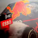 ABU DHABI, UNITED ARAB EMIRATES - DECEMBER 01: Second placed Max Verstappen of Netherlands and Red Bull Racing celebrates with donuts on track during the F1 Grand Prix of Abu Dhabi at Yas Marina Circuit on December 01, 2019 in Abu Dhabi, United Arab Emirates. (Photo by Clive Mason/Getty Images)