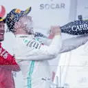 BAKU CITY CIRCUIT, AZERBAIJAN - APRIL 28: Valtteri Bottas, Mercedes AMG F1, 1st position, sprays the victory Champagne into his face during the Azerbaijan GP at Baku City Circuit on April 28, 2019 in Baku City Circuit, Azerbaijan. (Photo by Zak Mauger / LAT Images)
