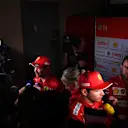 BAHRAIN INTERNATIONAL CIRCUIT, BAHRAIN - MARCH 29: Sebastian Vettel, Ferrari, and Charles Leclerc, Ferrari, talk to the media during the Bahrain GP at Bahrain International Circuit on March 29, 2019 in Bahrain International Circuit, Bahrain. (Photo by Simon Galloway / Sutton Images)