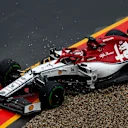 HOCKENHEIMRING, GERMANY - JULY 28: Kimi Raikkonen, Alfa Romeo Racing C38, rejoins after a trip into the gravel during the German GP at Hockenheimring on July 28, 2019 in Hockenheimring, Germany. (Photo by Sam Bloxham / LAT Images)