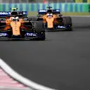 HUNGARORING, HUNGARY - AUGUST 02: Lando Norris, McLaren MCL34, leads Carlos Sainz Jr., McLaren MCL34 during the Hungarian GP at Hungaroring on August 02, 2019 in Hungaroring, Hungary. (Photo by Jerry Andre / LAT Images)