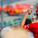 HUNGARORING, HUNGARY - AUGUST 03: Ferrari fan watching the crash of Charles Leclerc, Ferrari SF90 during the Hungarian GP at Hungaroring on August 03, 2019 in Hungaroring, Hungary. (Photo by Zak Mauger / LAT Images)