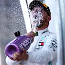 SUZUKA, JAPAN - OCTOBER 13: Race winner Valtteri Bottas of Finland and Mercedes GP celebrates on the podium during the F1 Grand Prix of Japan at Suzuka Circuit on October 13, 2019 in Suzuka, Japan. (Photo by Mark Thompson/Getty Images)