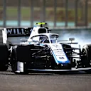 ABU DHABI, UNITED ARAB EMIRATES - DECEMBER 11: Nicholas Latifi of Canada driving the (6) Williams Racing FW43 Mercedes locks up during practice ahead of the F1 Grand Prix of Abu Dhabi at Yas Marina Circuit on December 11, 2020 in Abu Dhabi, United Arab Emirates. (Photo by Bryn Lennon/Getty Images)