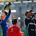 SPIELBERG, AUSTRIA - JULY 05: Third placed Lando Norris of Great Britain and McLaren F1 celebrates on the podium during the Formula One Grand Prix of Austria at Red Bull Ring on July 05, 2020 in Spielberg, Austria. (Photo by Clive Mason - Formula 1/Formula 1 via Getty Images)