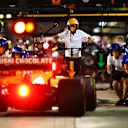 BAHRAIN, BAHRAIN - NOVEMBER 27: Carlos Sainz of Spain driving the (55) McLaren F1 Team MCL35 Renault stops in the Pitlane during practice ahead of the F1 Grand Prix of Bahrain at Bahrain International Circuit on November 27, 2020 in Bahrain, Bahrain. (Photo by Mark Thompson/Getty Images)