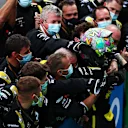 NUERBURG, GERMANY - OCTOBER 11: Third placed Daniel Ricciardo of Australia and Renault Sport F1 celebrates with team members in parc ferme during the F1 Eifel Grand Prix at Nuerburgring on October 11, 2020 in Nuerburg, Germany. (Photo by Dan Istitene - Formula 1/Formula 1 via Getty Images)