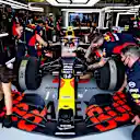 NORTHAMPTON, ENGLAND - AUGUST 01: The Red Bull Racing team work on the car of Alexander Albon of Thailand and Red Bull Racing in the garage during final practice for the F1 Grand Prix of Great Britain at Silverstone on August 01, 2020 in Northampton, England. (Photo by Mark Thompson/Getty Images)