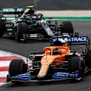 PORTIMAO, PORTUGAL - OCTOBER 25: Carlos Sainz of Spain driving the (55) McLaren F1 Team MCL35 Renault leads Valtteri Bottas of Finland driving the (77) Mercedes AMG Petronas F1 Team Mercedes W11 on track during the F1 Grand Prix of Portugal at Autodromo Internacional do Algarve on October 25, 2020 in Portimao, Portugal. (Photo by Rudy Carezzevoli/Getty Images)