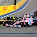 SOCHI, RUSSIA - SEPTEMBER 27: Esteban Ocon of France driving the (31) Renault Sport Formula One Team RS20 and Sergio Perez of Mexico driving the (11) Racing Point RP20 Mercedes on track during the F1 Grand Prix of Russia at Sochi Autodrom on September 27, 2020 in Sochi, Russia. (Photo by Yuri Kochetkov - Pool/Getty Images)