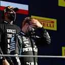 SCARPERIA, ITALY - SEPTEMBER 13: Race winner Lewis Hamilton of Great Britain and Mercedes GP stands on the podium during the F1 Grand Prix of Tuscany at Mugello Circuit on September 13, 2020 in Scarperia, Italy. (Photo by Rudy Carezzevoli/Getty Images)