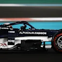 ABU DHABI, UNITED ARAB EMIRATES - DECEMBER 10:Yuki Tsunoda of Japan driving the (22) Scuderia AlphaTauri AT02 Honda  during practice ahead of the F1 Grand Prix of Abu Dhabi at Yas Marina Circuit on December 10, 2021 in Abu Dhabi, United Arab Emirates. (Photo by Bryn Lennon/Getty Images)